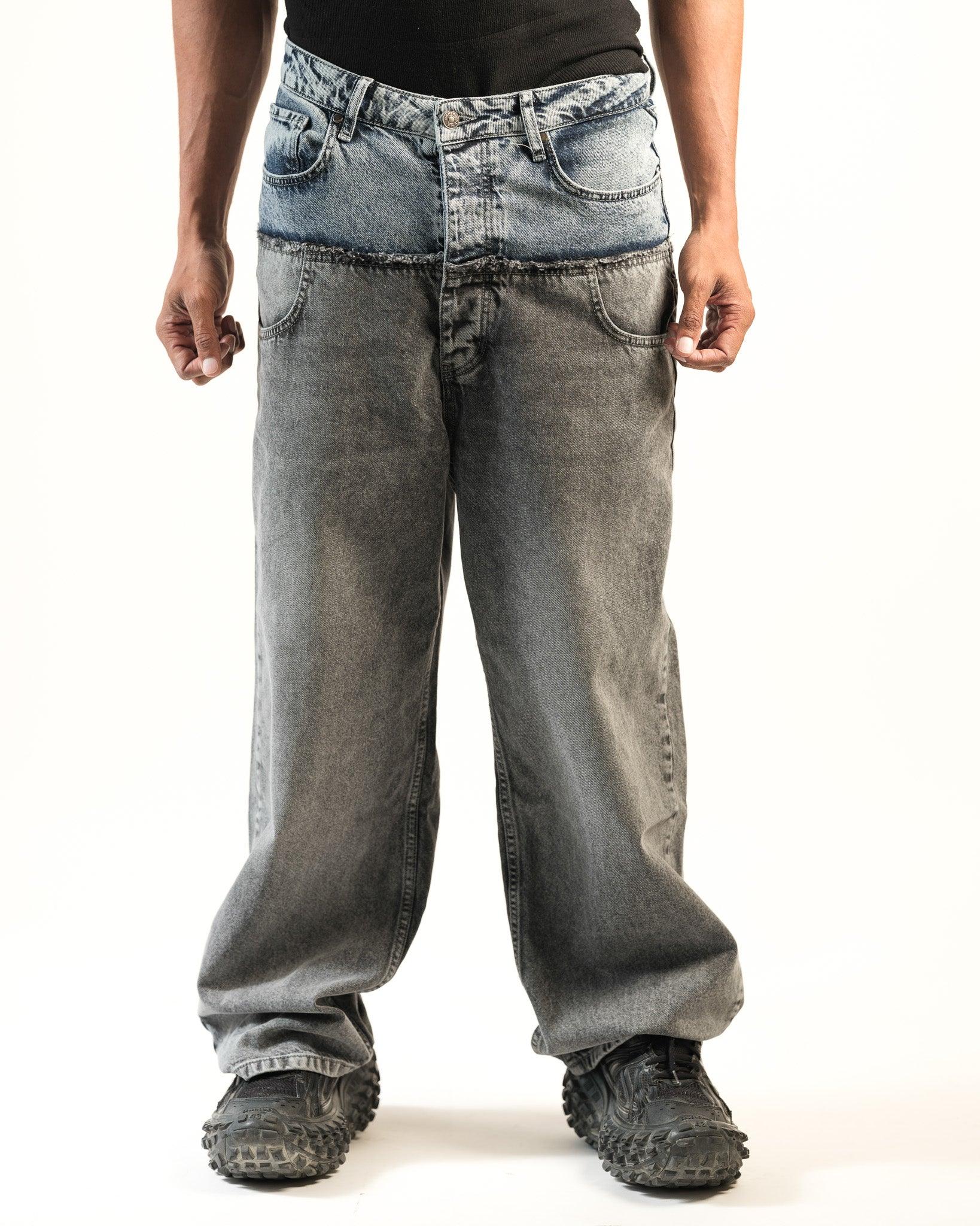 Front full length view of model in oversized grey Dual Texture Denim Jeans by Flashmob Nation.