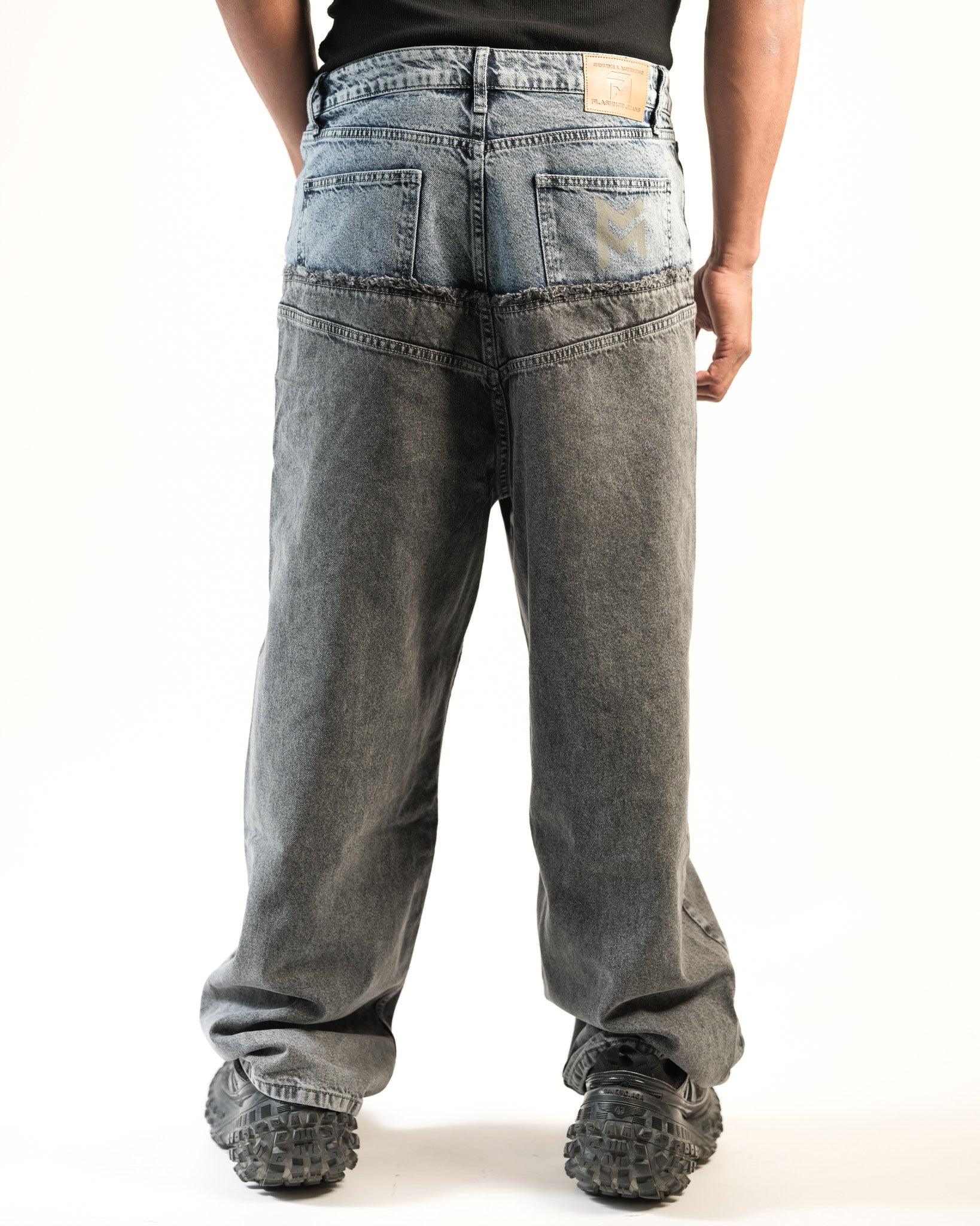 Back full length view of model wearing oversized Dual Texture Denim Jeans by Flashmob Nation India.
