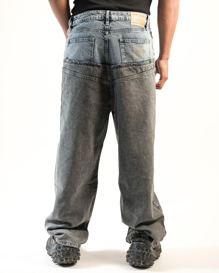 Back full length view of model wearing oversized Dual Texture Denim Jeans by Flashmob Nation India.