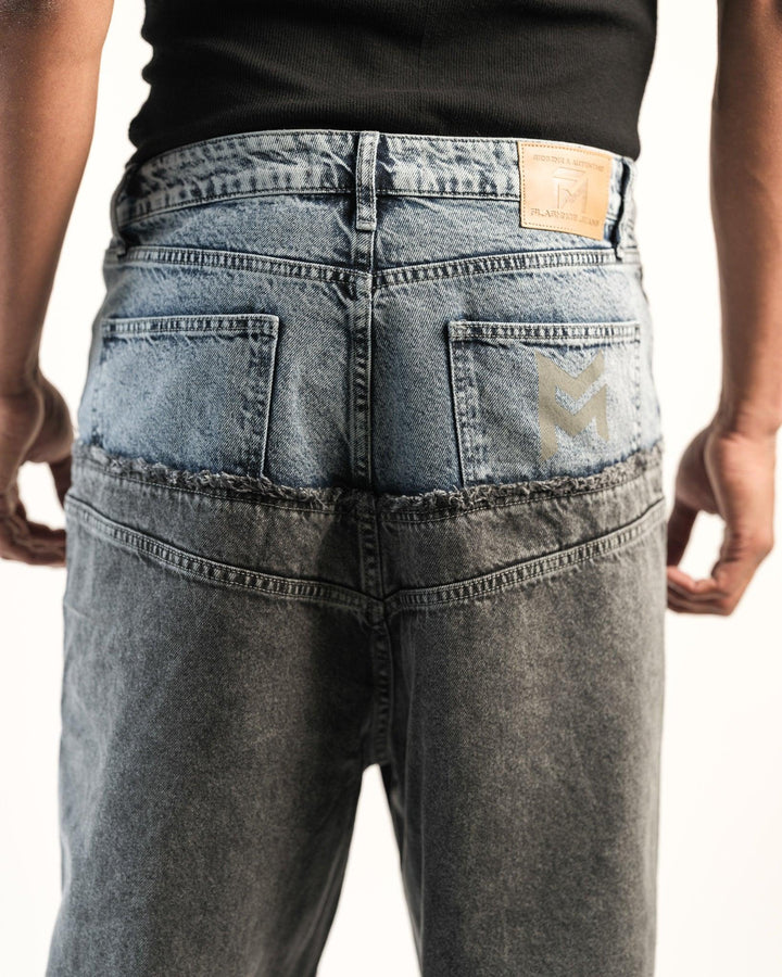 Close up back view of Dual Texture Denim Jeans with pocket and logo patch details by Flashmob Nation.