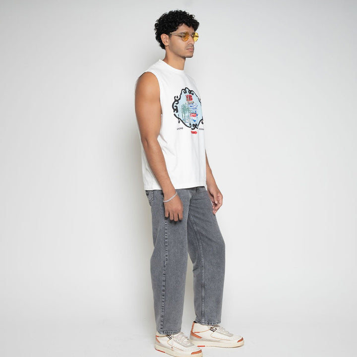 Three quarter front view of model in Faded Mob Palace Sleeveless T-Shirt by Flashmob Nation.