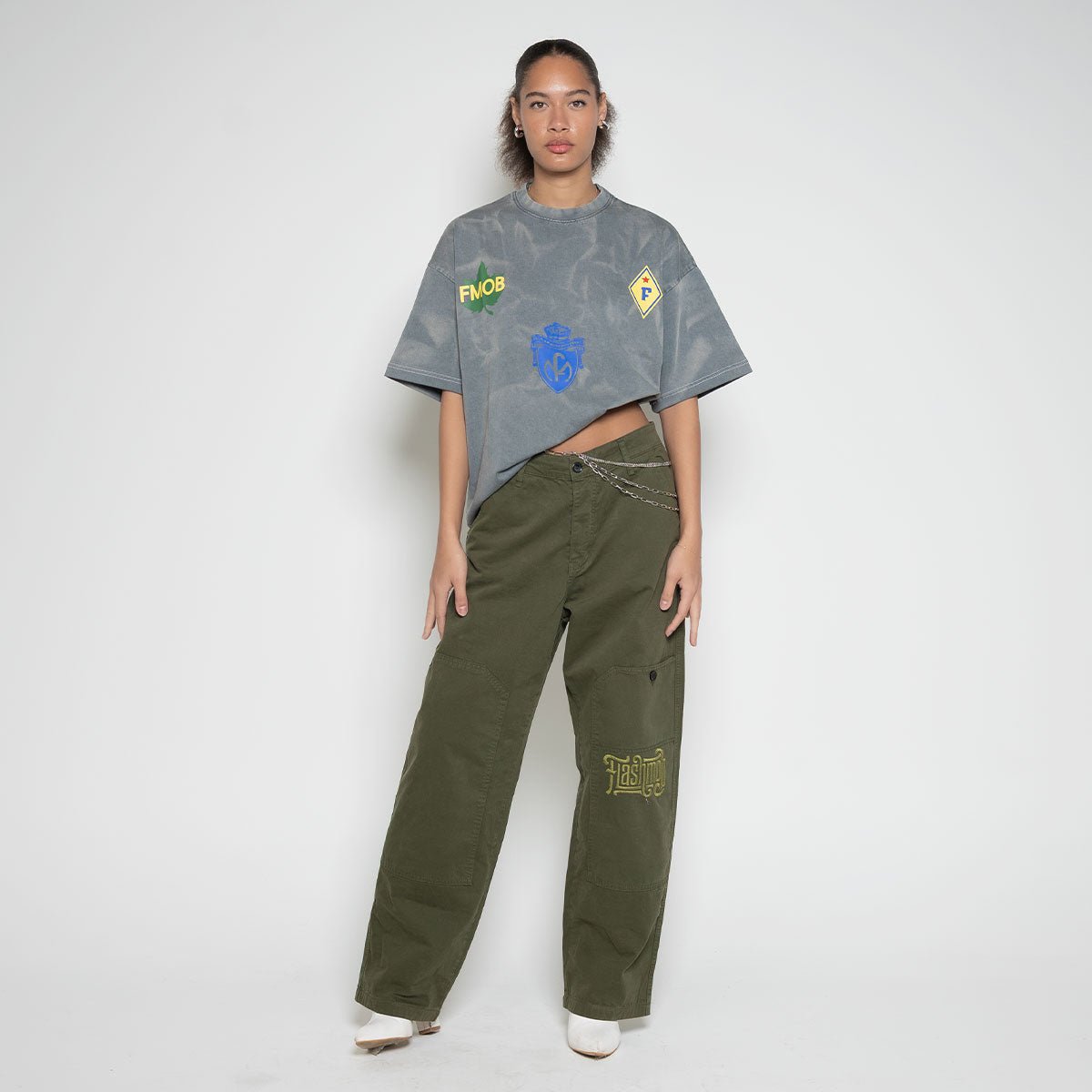 Lifestyle profile of the women's FM AF1 Walking Cargo Pants showing structural 6-pocket detail and clean seam lines