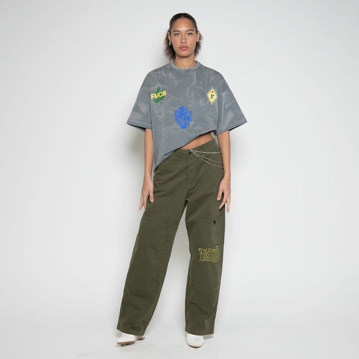 Lifestyle profile of the women's FM AF1 Walking Cargo Pants showing structural 6-pocket detail and clean seam lines
