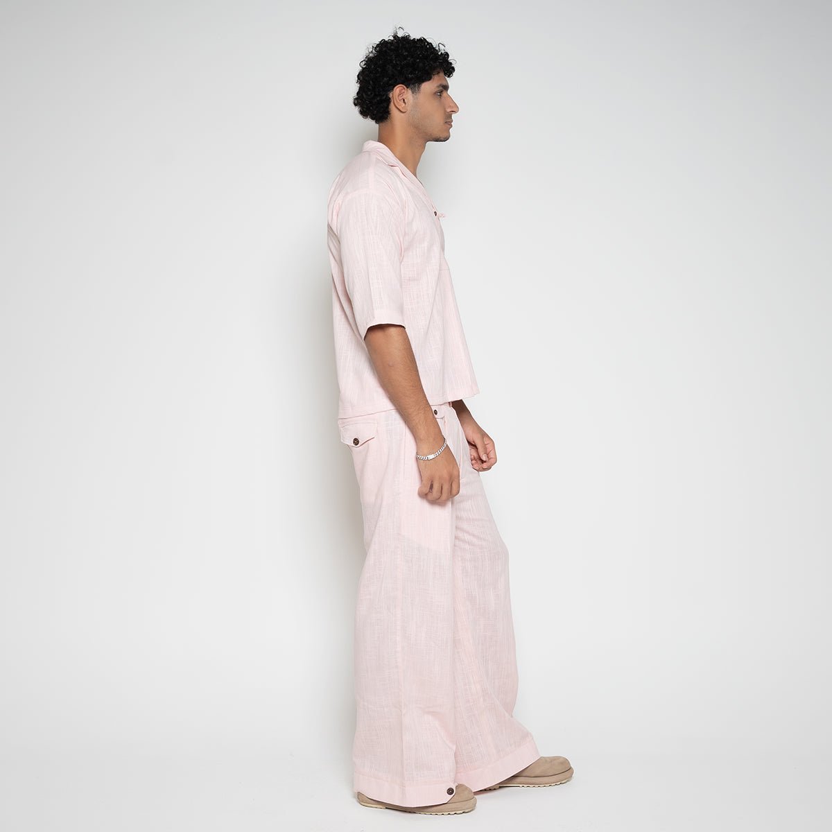 Three quarter view of model in Men's Linen Casual Summer Wear set in Pink Ombre by Flashmob Nation India.